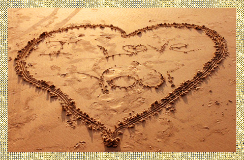 рисунок сердца на песке